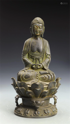 A BRONZE SEATED SAKYAMUNI