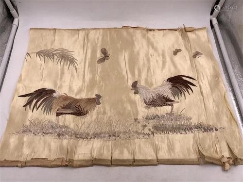 AN EMBROIDERY OF ROOSTERS