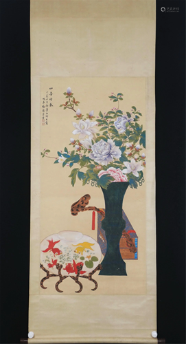 A CHINESE SCROLL PAINTING OF FLOWERS AND FISH