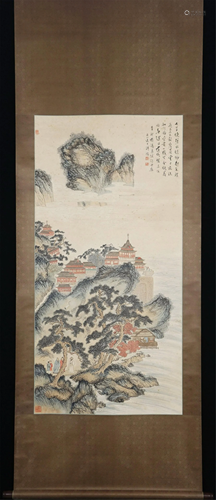 A CHINESE SCROLL PAINTING OF MOUNTAIN PAVILIONS