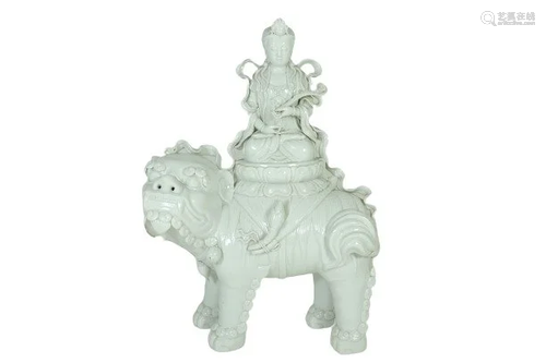 A DEHUA FIGURE OF MANJUSHRI SEATED ON A LION