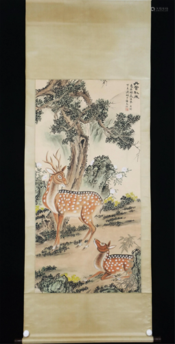 A CHINESE SCROLL PAINTING OF DEER AND PINE TREE