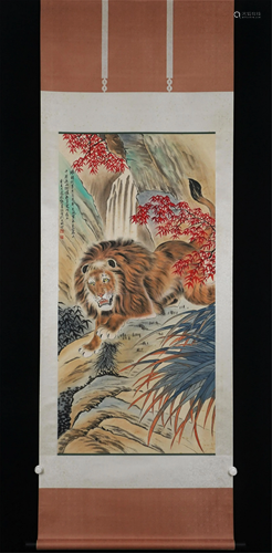 A CHINESE SCROLL PAINTING OF LION