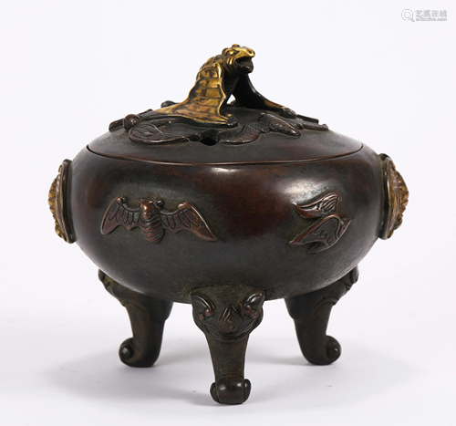 A BRONZE GILT TRIPOD CENSER WITH BEAST CARVINGS