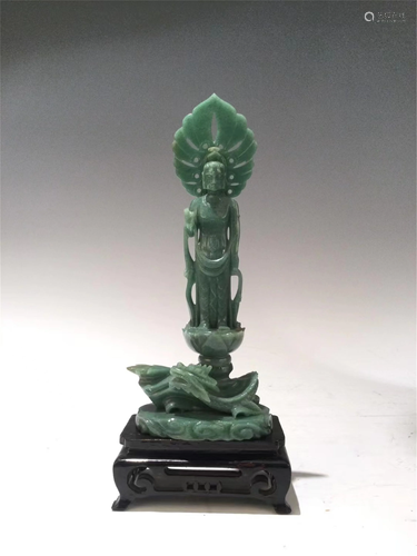 A GREEN JADE CARVED AVALOKITESVARA AND DRAGON