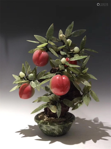 A PEACH BONSAI WITH JADE BASIN