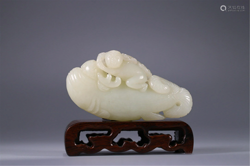 A CARVED JADE DECORATION