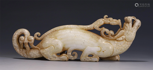 A JADE CARVED DRAGON