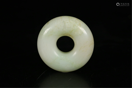 A CIRCULAR JADE DECORATION