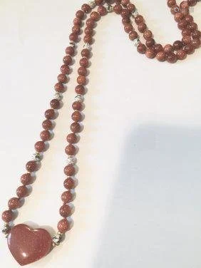 Estate jewelry, gold stone designed necklace