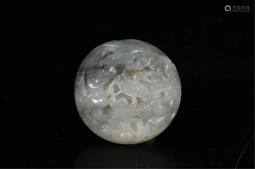 A CARVED DRAGON PHOENIX JADE BOX AND COVER