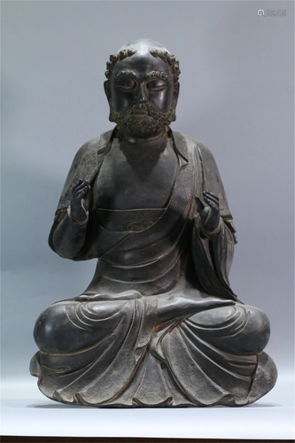 A BRONZE SEATED BODHIDHARMA