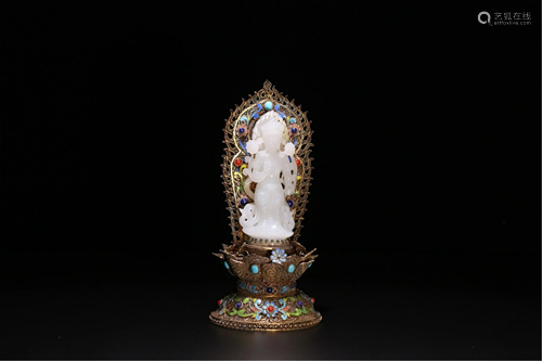 A JADE AVALOKITESVARA WITH GILT SILVER BUDDHA NICHE