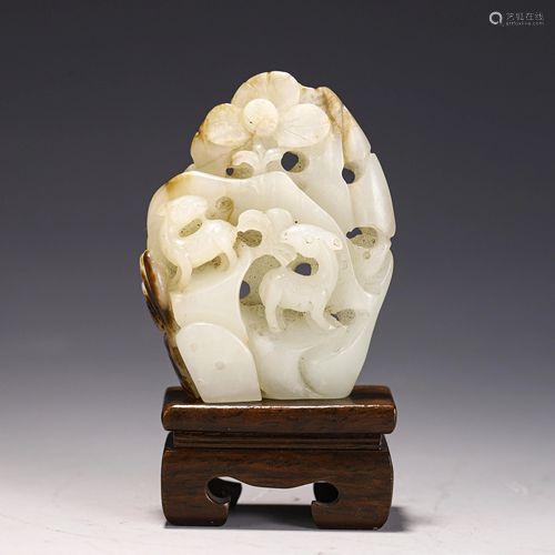 A JADE CARVED DECORATION