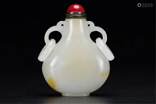 A JADE CAVED SNUFF BOTTLE WITH DOUBLE HANDLES