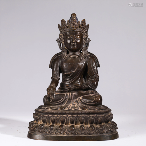 A BRONZE BUDDHA STATUETTE