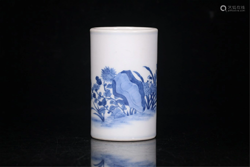 A BLUE AND WHITE BUTTERFLY-AND-FLOWER BRUSH POT