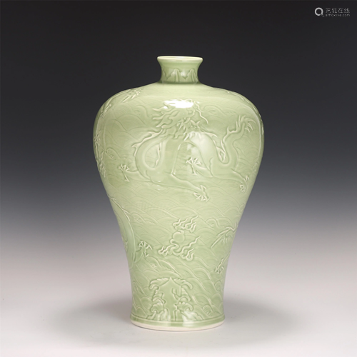 A PEA GREEN GLAZE INCISED DRAGON VASE