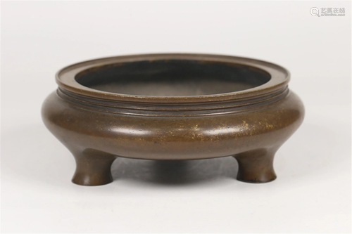 A BRONZE TRIPOD CENSER