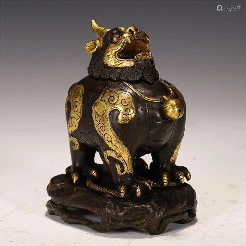 A BRONZE GILT MYTHICAL BEAST SHAPE INCENSE BURNER