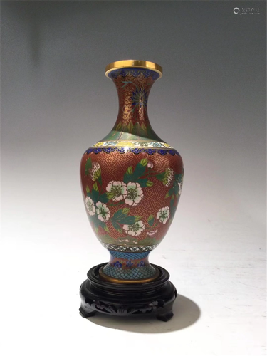 A RED GROUND CLOISONNE ENAMEL FLORAL VASE