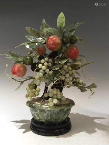 A PEACH AND GRAPE BONSAI WITH JADE BASIN