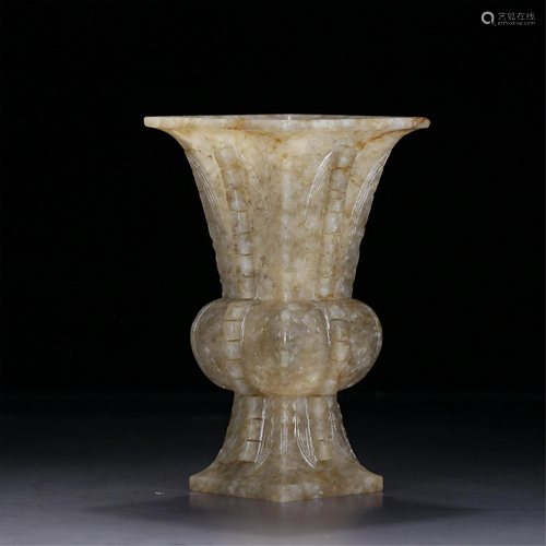 A CARVED JADE GU VASE