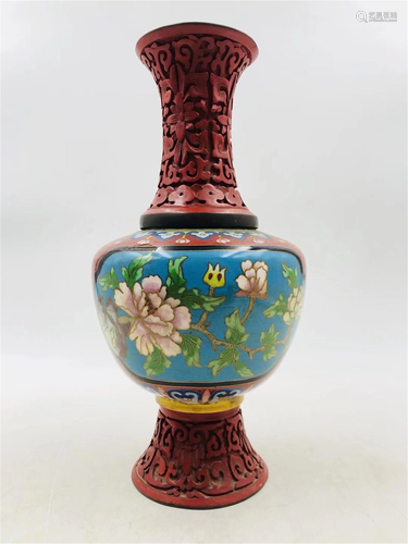 A CLOISONNE ENAMEL AND CARVED RED LACQUER VASE