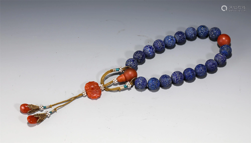 A STRING OF LAPIS LAZULI PRAYER BEADS