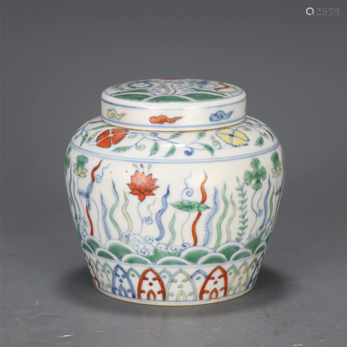 A DOUCAI GLAZE FLORAL JAR AND COVER