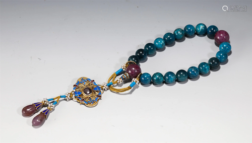 A STRING OF BLUE HARD-STONES PRAYER BEADS