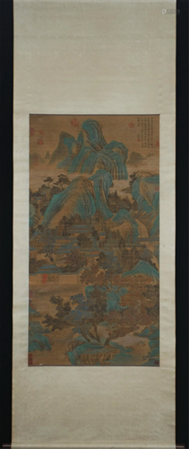 A CHINESE SILK PAINTING OF DWELLING IN MOUNTAINS