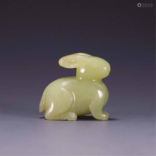 A YELLOW JADE CARVING OF RABBIT