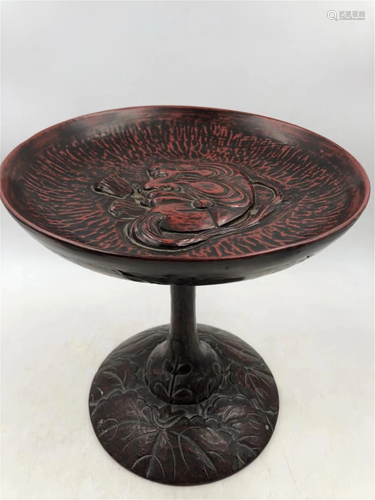 A CARVED AND LACQUERED WOODEN STEM PLATE