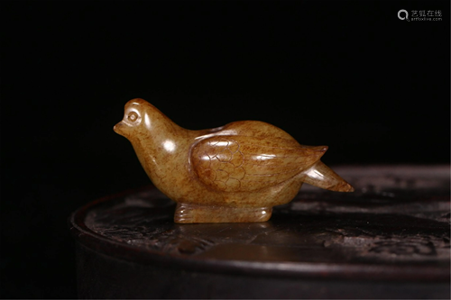 A BIRD SHAPED JADE CARVING