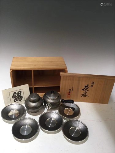 A SET OF TIN TEA WARES