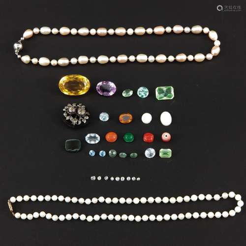 A Collection of Jewelry and Gemstones