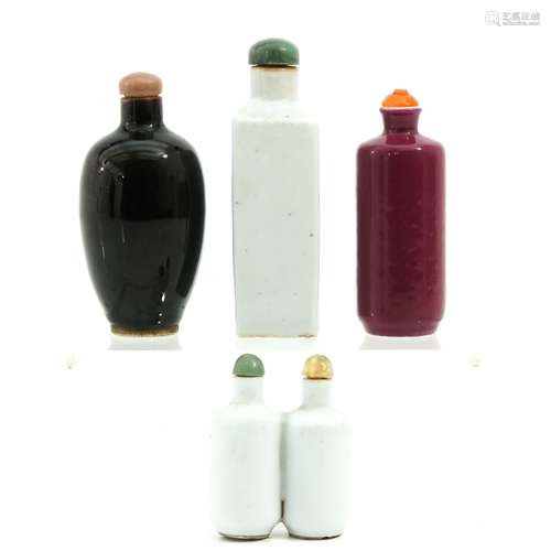 A Collection of 4 Snuff Bottles