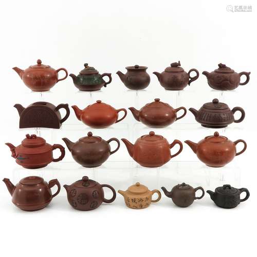 A Collection of 18 Yixing Teapots