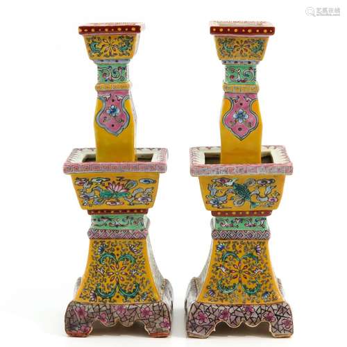 A Pair of Famille Rose Altar Candlesticks