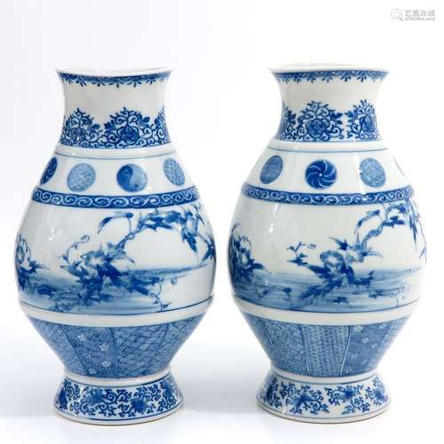 A pair of blue and white vases