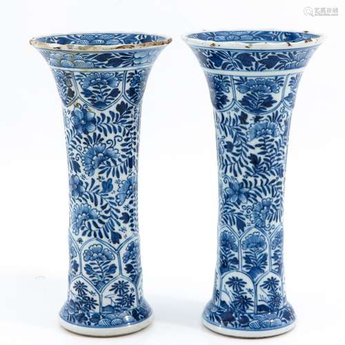 A pair of blue and white vases