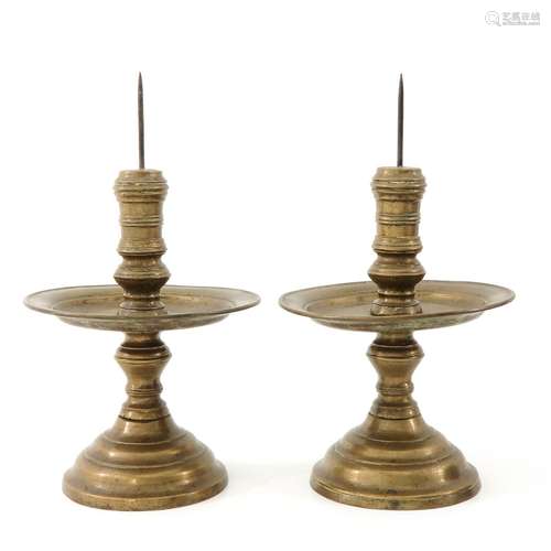 A Pair of Antique Brass Candlesticks