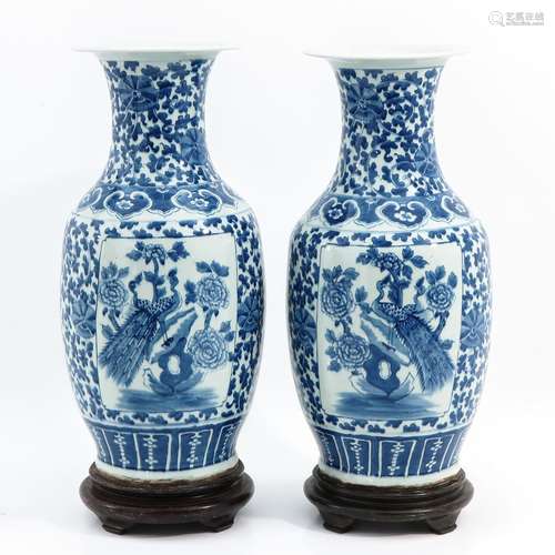 A pair of blue and white vases