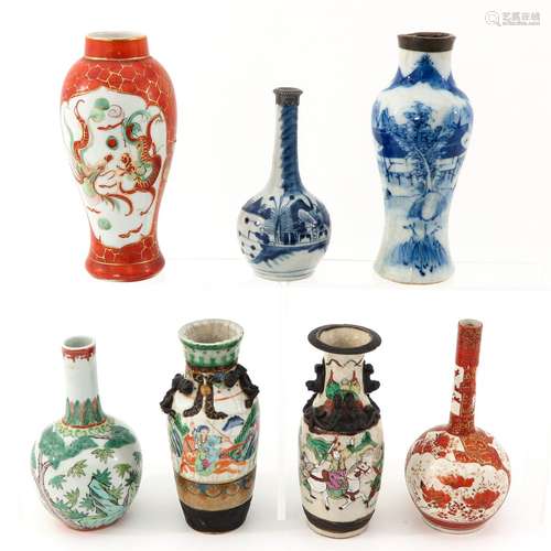 A Collection of 7 Vases