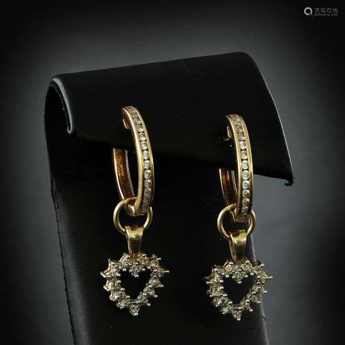 A Pair of 14KG Diamond Earrings