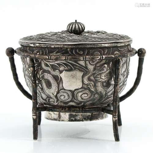 A Silver Covered Pot and Stand