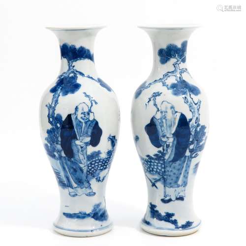 A pair of blue and white vases