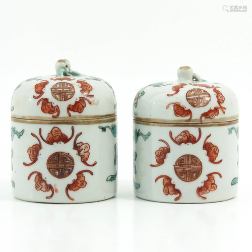 A Pair of Polychrome Decor Jars with Covers