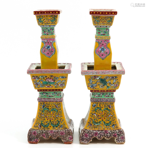 A Pair of Famille Rose Altar Candlesticks